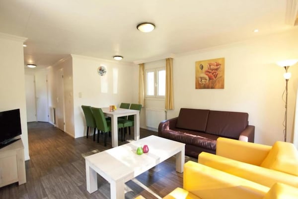 Foto van Chalet met groen en terras - Vakantiehuis in Otterlo - LivingRoom
