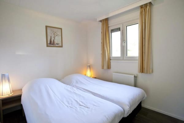 Foto van Chalet met groen en terras - Vakantiehuis in Otterlo - BedRoom