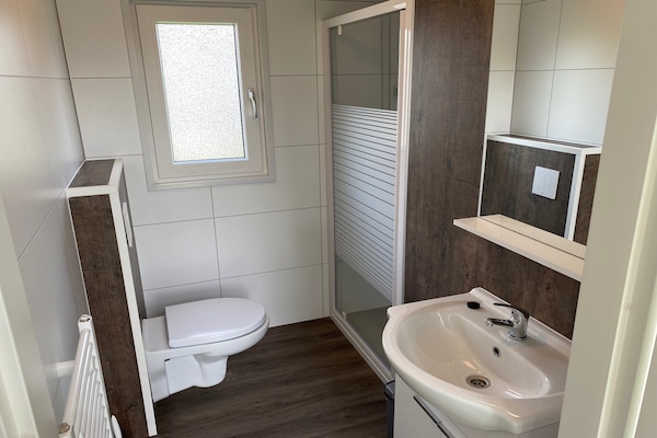 Foto van Chalet in Gelderland met ruime tuin - Vakantiehuis in Lathum - BathRoom