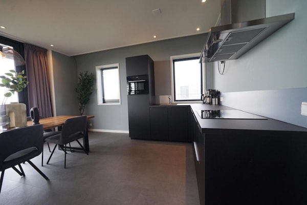 Foto van Chalet met één verdieping en veranda - Vakantiehuis in Lochem - Kitchen
