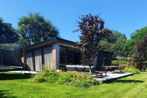 Foto van Rustig chalet dichtbij Norg - Vakantiehuis in Haulerwijk - ExteriorSummer