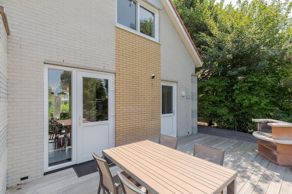 Foto van Bungalow aan het water met tuin - Vakantiehuis in Makkum - TerraceBalcony