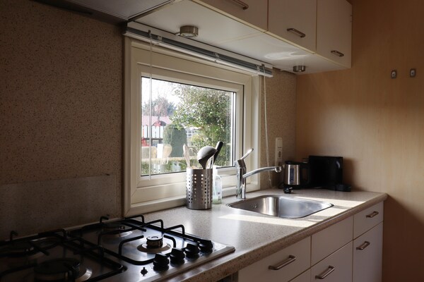 Foto van Charmant duinchalet tussen golfbaan en strand - Vakantiehuis in Hollum - Kitchen