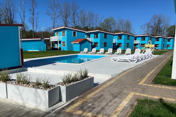 Foto van Comfortabel vakantiehuis (nr. 13), zwembad - Vakantiehuis in Rewal - ExteriorSummer