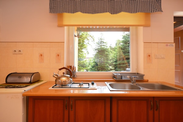 Foto van Een rustig huisje in een dorp aan zee. Woonkamer, twee slaapkamers. - Kitchen