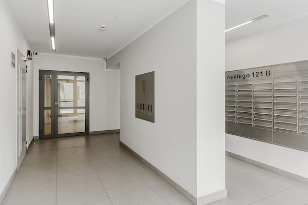 Foto van Gezellig appartement vlakbij Manufaktura - Vakantiehuis in Łódź - Landing