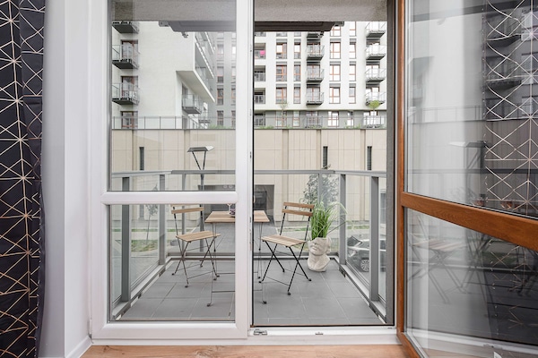 Foto van Gezellig appartement vlakbij Manufaktura - Vakantiehuis in Łódź - TerraceBalcony