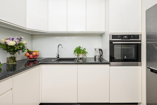 Foto van Gezellig appartement vlakbij Manufaktura - Vakantiehuis in Łódź - Kitchen