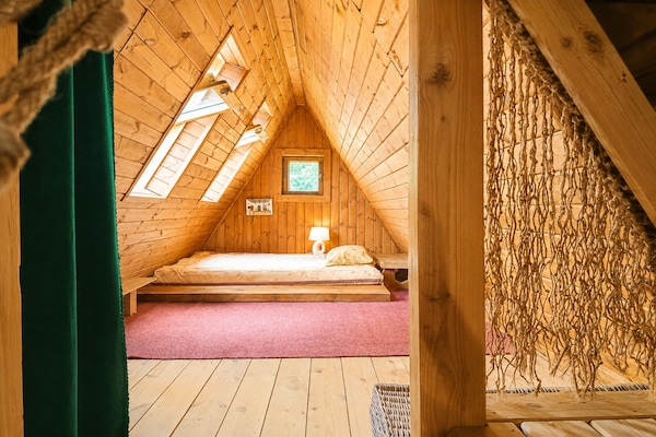 Foto van Geweldig vakantiehuis midden in de natuur en direct aan het meer, Natac Wielka - BedRoom