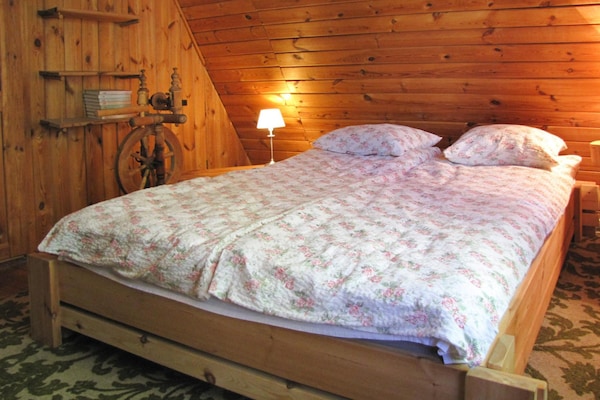 Foto van Geweldig vakantiehuis midden in de natuur en direct aan het meer, Natac Wielka - BedRoom