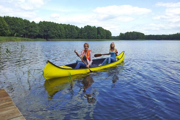 Foto van Geweldig vakantiehuis midden in de natuur en direct aan het meer, Natac Wielka - WaterView