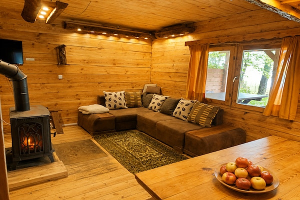 Foto van Geweldig vakantiehuis midden in de natuur en direct aan het meer, Natac Wielka - LivingRoom