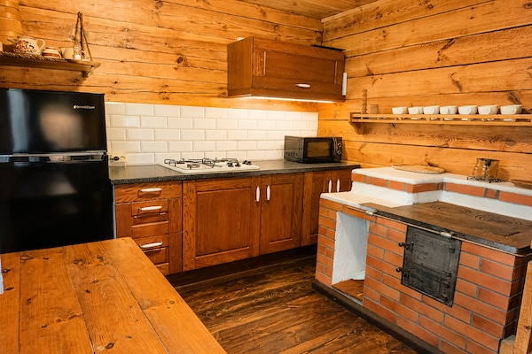 Foto van Geweldig vakantiehuis midden in de natuur en direct aan het meer, Natac Wielka - Kitchen