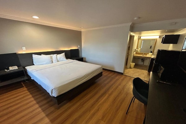 Foto van 1 kingsize bed | Rookvrij, koelkast - Vakantiehuis in Mojave - BedRoom